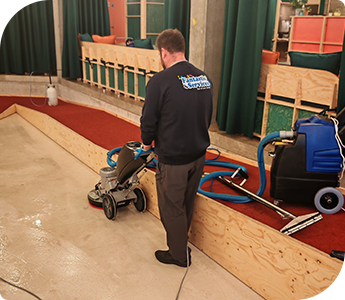 commercial-hard-floor-cleaning-service-d Fantastic Services technician cleaning hard floor in commercial property