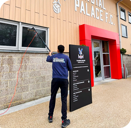 Exterior cleaning at Crystal Palace FC training ground by a Fantastic Services technician