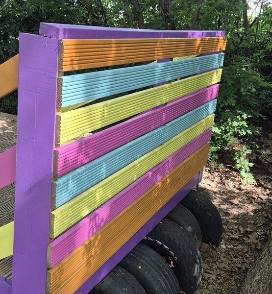 painted-tyre-bridge Freshly painted colourful wooden bridge with tyres