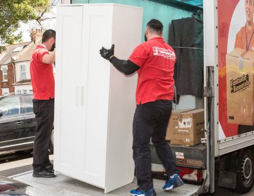 removal team loading a wardrobe